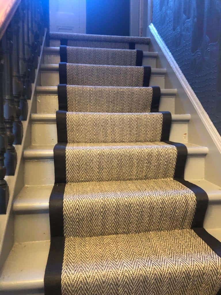 Stair carpet runner with black binding