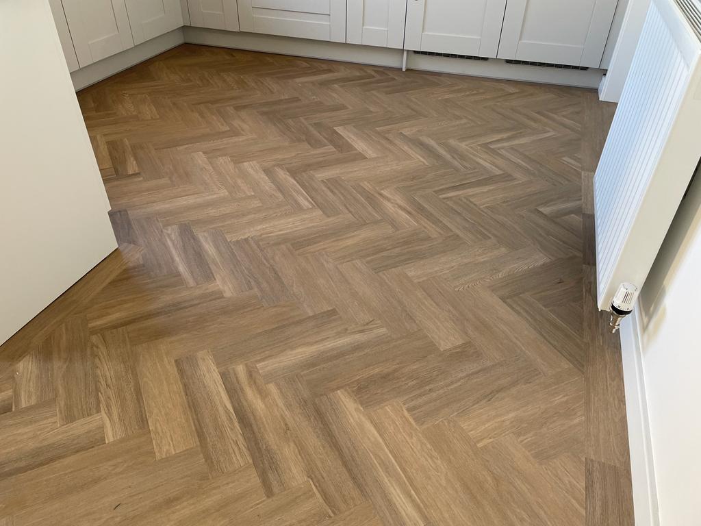 LVT fitted by our specialist fitter Dom in a herringbone pattern